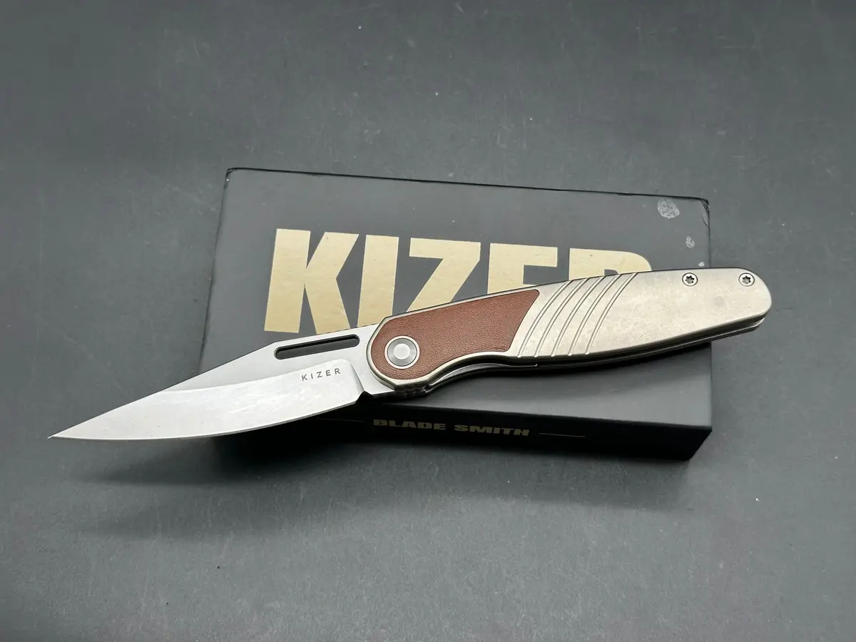 Kizer Raze Silver/Brown Titanium/Leather Handle S45vn Clip Point Plain Edge 1