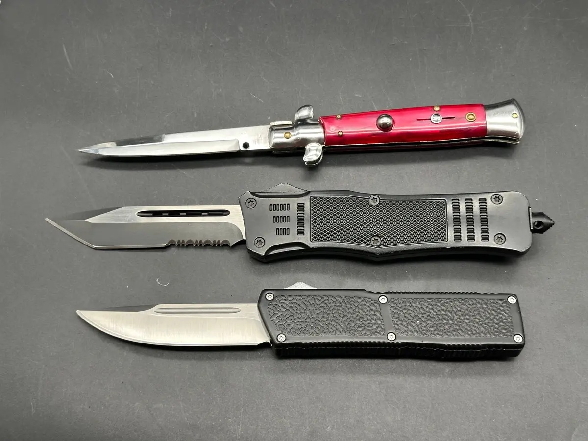 Akc Red Stilleto Side Auto, Lightning Elite Otf, And Atomic Defender Large Serrated Tanto Otf 1